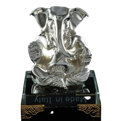 Silver plated metal Ganesha on a glass base